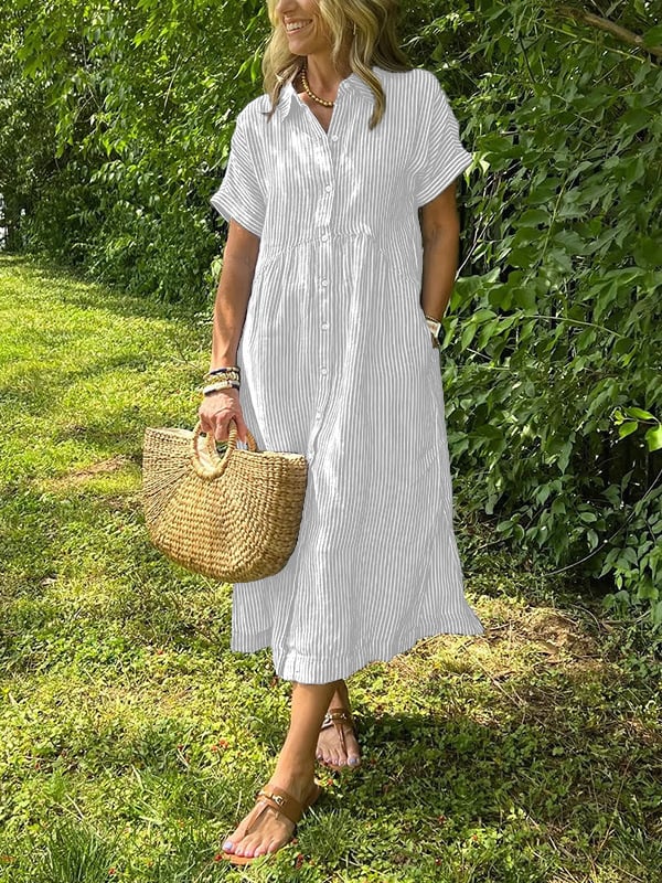 New button-up dress with striped flaps at the bottom | With functional pockets
