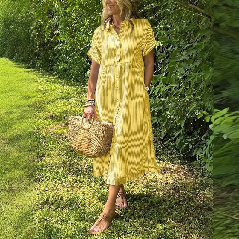 New button-up dress with striped flaps at the bottom | With functional pockets