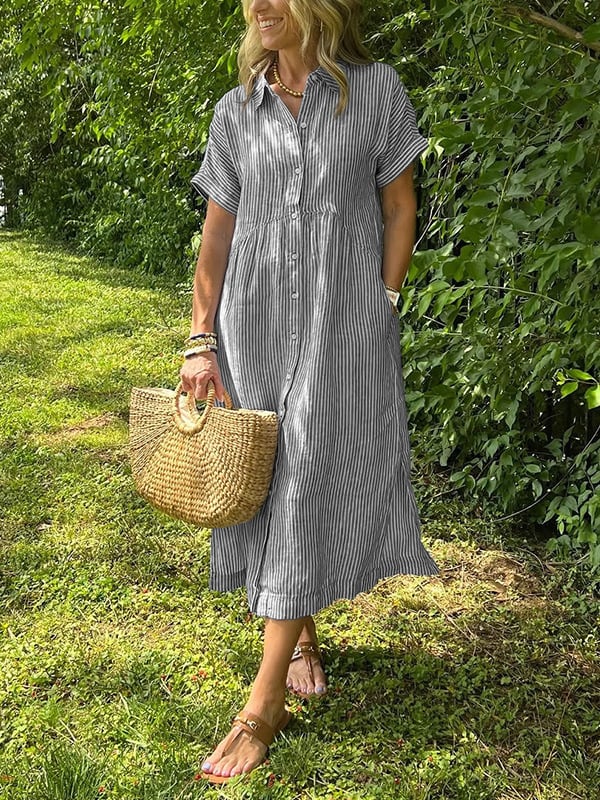 New button-up dress with striped flaps at the bottom | With functional pockets